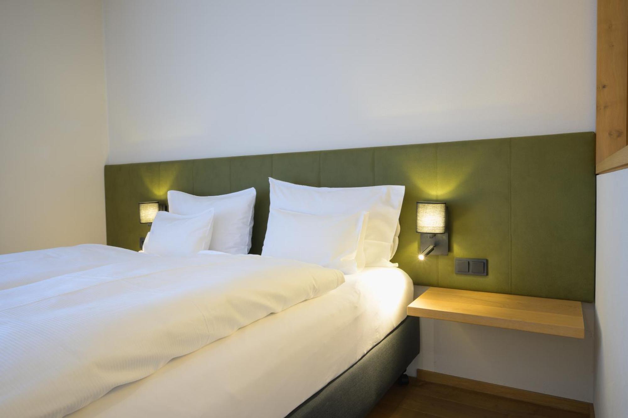 Deluxe Zimmer mit Gartenblick und Balkon